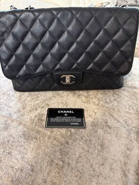 CHANEL Black Quilted Flap Shoulder Bag with Silver CC Hardware
